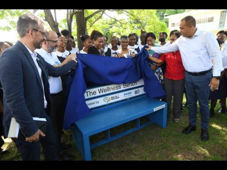 From left: unveiling the Wellness bench are Vicente Teran, deputy Representative of UNICEF, Ian Stein, PAHO/WHO Representative to Jamaica, Bermuda, and the Cayman Islands, Senator, Dr Sapphire Longmore, Kali McMorris, Principal of Convent of Mercy Academy 