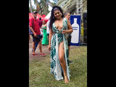 The palm-leaf designed monokini dress is the right fit for Talia Chen, who opted to show a little leg.
