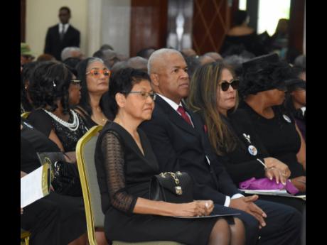 From Left: Daphne Corrodus, widow of former St James Custos Ewen Corrodus; son Paul Corrodus and his wife, Sharon; and daughter Sally Corrodus at the thanksgiving service for the late businessman at the Montego Bay Convention Centre on Sunday.