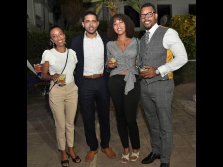Let’s drink to 11 years. From left: Creative Director of EduFocal Shara Morris is joined by attorney-at-law Alexander Corrie, medical doctor Simone Green; and attorney-at-law Mikhail Jackson.