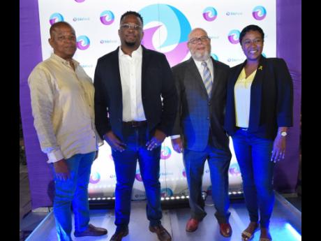 EduFocal’s chief executive officer, Gordon Swaby (second left), is joined by company directors Lloyd Swaby, (left), Gordon’s father; and Shauna Fuller-Clarke (right); as well as the chairman, Peter Levy.