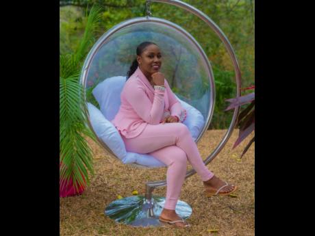 Sheraine Reid, marketing and communications manager, Half Moon, struck a pose in one of the hanging ball chairs. 