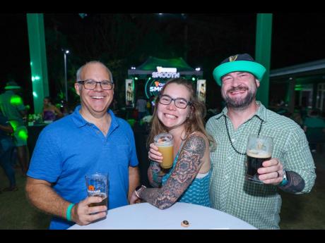 From left: Craig Conway, Alina Pitts and her husband Michael enjoyed the fare at the St Patrick’s Day celebration at the Clubhouse Brewery. 