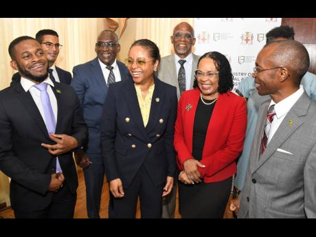 Marlene Mahaloo-Forte, (centre) minister of legal and constitutional affairs, with some members of Constitutional Reform Committee (from left) Sujae Boswell, Professor Richard Albert, David Henry, Hugh Small, Donna Scott-Mottley and Rocky Meade at Jamaica 