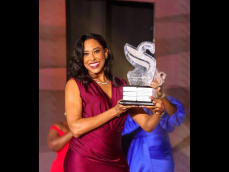 The stunning Christine Grant, pension administrator at Sagicor Life, took home the Team Member of the Year Award.