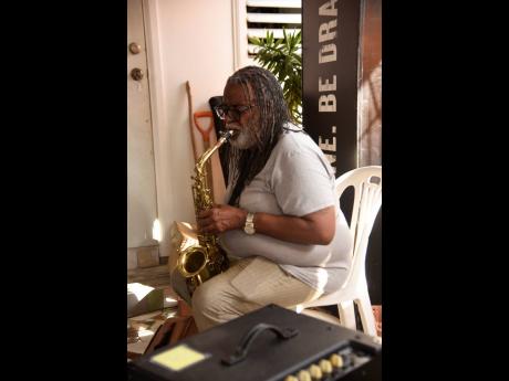 Saxophonist Dean Fraser plays at a recent Dragon Be the One Reasoning Session at the Eastwood Park Gardens comminty centre. 