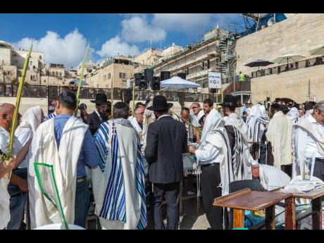Crowd of Jewish worshippers in the area of the Western Wall.
