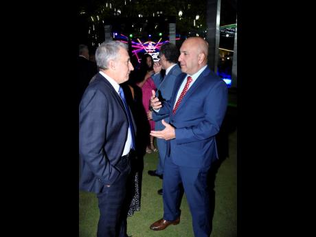Our lens snapped Chief Executive Officer of JFP Limited and President of The Private Sector Organisation of Jamaica, Metry Seaga (left) in coversation with President and CEO of Sagicor Group Jamaica, Chris Zacca.