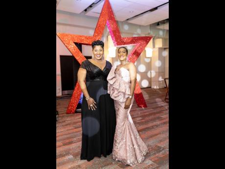 Marketing executives Stacy-Ann Williams Smith (left), brand and corporate public relations manager, Red Stripe, and Tyheissa ‘Ty’ Williams, communications manager, internal and digital marketing, are picture-perfect in black and blush.

