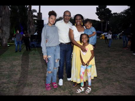 Eager to see Ras I, Jamila Falak, and Queen Ifrica, the Lyns – (from left) Samantha, Wil, Shatanya, Arya, and baby Amelia Lyn – used the occasion as family bonding time. 