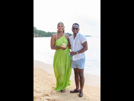 BELOW: The beautiful coastline is the perfect backdrop for Tianna Porter, marketing and sales officer, PROVEN Properties, and Kemal Brown, CEO, Digital Global Marketing Ltd.