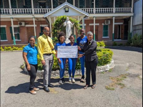 Go Alpha! PROComm has thrown its support behind the Convent of Alpha Academy (‘Alpha’) Champs team with a contribution of $200,000. Making the presentation are Anita Chin (left), chief operating officer, and Errol Howlett to principal Kali McMorris (ri
