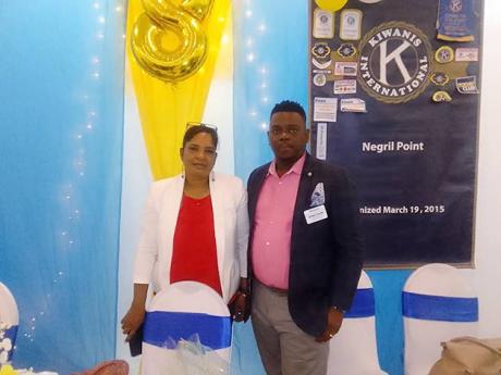 Lieutenant Governor of the Kiwanis International Division 25 (Cornwall), Anthony Cameron (right)  with President of the Kiwanis Club of Negril Point, Indira Mangar Weise (left) at an event  to mark the culmination of the anniversary week of activities for 