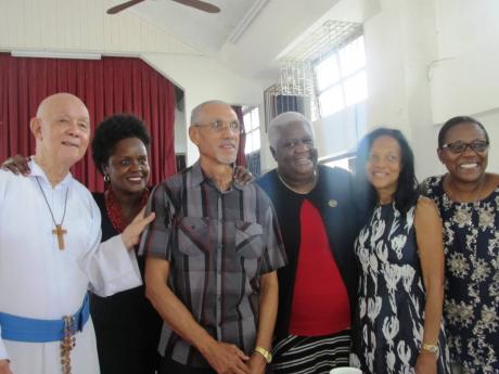 In this 2016 photo (From left) Father Richard Ho Lung, Renee Rattray, Alwin Bully, Grace Jervis, Rose Cameron and Darcy Tulloch pose for a group shot.