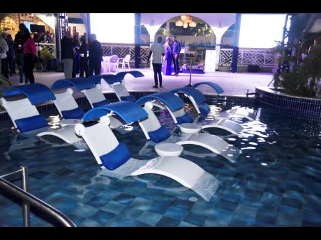 The cool blue tiles of the pool sparkled at night. And guest are loving the floating luxury loungers.