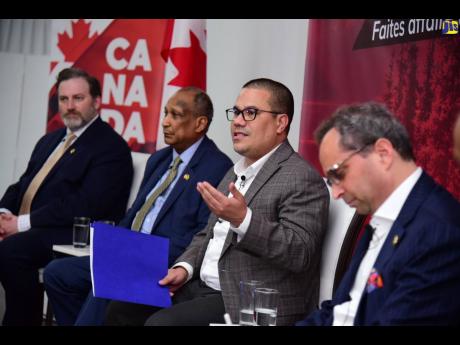 Minister without Portfolio in the Ministry of Economic Growth and Job Creation, Matthew Samuda (second right), at the High Commission of Canada in Jamaica’s Policy and Regulatory Masterclass – The Climate Approach, Also participating (from left) are Pr