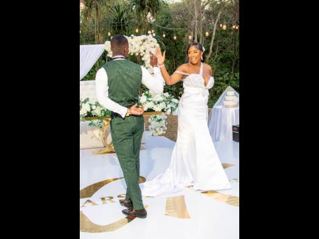 The husband-and-wife duo shared a magical first dance to a mashup of “Powerful” by Taurus Riley and Ellie Golding, and “Tadow” by Masego & FKJ, created by DJ Fenix.