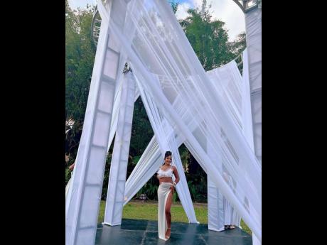 Julissa Rowe, wearing a stylish fit from Fashion Azari, was enchanted by the opulent arch, which stood as the focal point in the centre of the venue.