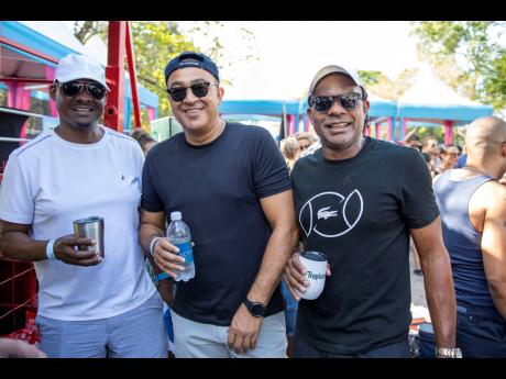 From left: Angus Gordon; Minister of Health and Wellness Dr Chris Tufton; and Stephen Steele, chairman IPrint Group, pose for a quick pic.