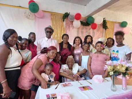 Some of the relatives who gathered to celebrate with Marjorie Laylor at her 100th birthday party recently.