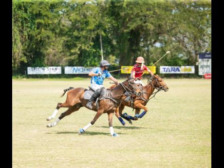 Polo players in action.