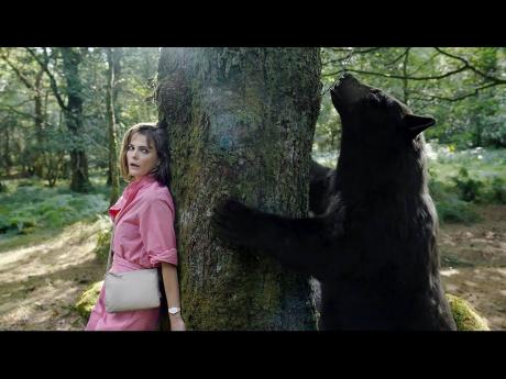 This image released by Universal Pictures shows Keri Russell in a scene from ‘Cocaine Bear’, directed by Elizabeth Banks.