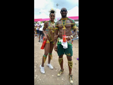 The couple that fêtes together ...  Alyshia Miller Powell told us it was her first time jumping in carnival and she was loving the vibe with hubby, Asafa Powell, by her side.