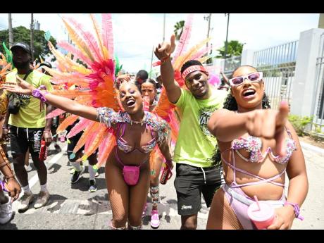 ‘Yardies’ enjoy themselves with Yard Mas Carnival.