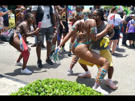 R&B singer Omarion enjoys carnival in Jamaica on Sunday. 