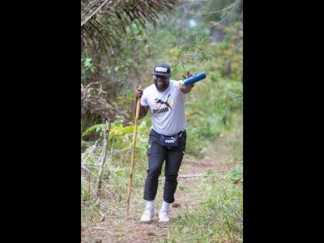 A determined trekker makes his way along the 10km trail at the Forest Trek on March 25.