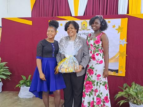 Dr Michelle Pinnock (centre), regional director for the Ministry of Education’s Region Four, stands with Melissa Woodstock (left) and K’Lee Peart, Grade 10 students of the Anchovy High School in Anchovy, St James, during the school’s inaugural Princi