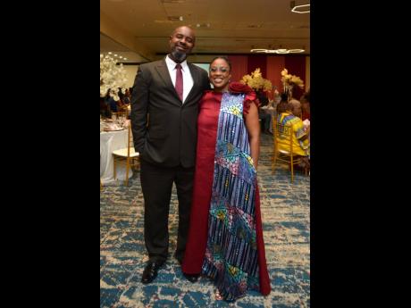 A regal Maia Wilson (right), who received The Distinguished’s Law Award, is supported by husband, Gregory Wilson.