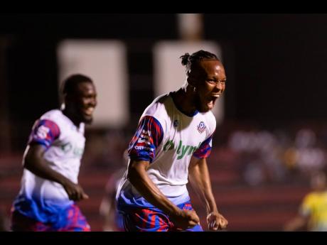 
Portmore United FC’s Stephen Young celebrates scoring against Molynes United during a Lynk Cup quarterfinal game at the Anthony Spaulding Sports Complex earlier in April.