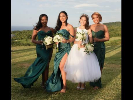 Flower girl and daughter of the bride; Arielle Meany (second right), shares lens with (from left) Allison Callam, Kirstin Williams, and Nikki Pottinger.