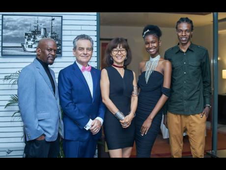 French Ambassador to Jamaica Olivier Guyonvarch (second left) and his wife Boulie Jeong (centre) with SAINT’s Avant Garde Designer of the Year champ Janseen Graham (left) and Fashion Faces of the Caribbean winners Drucillah Campbell and TK Wilson. 