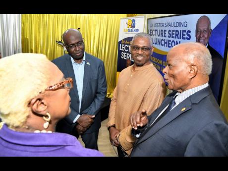 Former Governor General Professor Sir Kenneth Hall (right) engages (from left) Yvonne Wilks O’Grady, corporate affairs and marketing consultant at the RJRGLEANER Communications Group; Gary Allen, RJRGLEANER CEO; and guest speaker Dr Patrick Prendergast, 