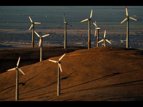 Wind turbines in operation at Livermore, California.AP