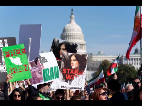 Demonstrators rally at the National Mall in Washington to protest against the Iranian regime, in October 2022, following the death of Mahsa Amini in the custody of the Islamic republic’s notorious ‘morality police’.