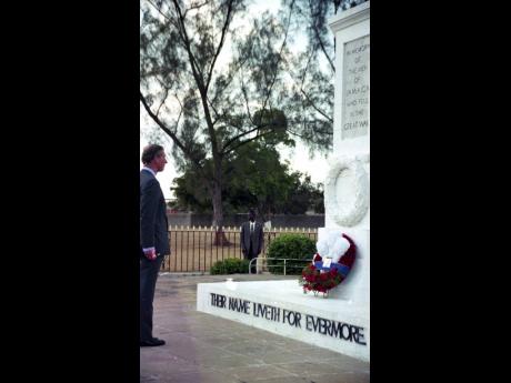 Charles, Prince of Wales, lays a wreath at the cenotaph at National Heroes’ Park in March 2000 in paying respects to Jamaicans who died fighting for Britain in World Wars I and II.
