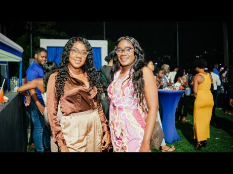 The launch of the all-electric 2023 BMW iX1 was a family affair for Shoyagaye Edwards (left) and her sister, Marcells Edwards.