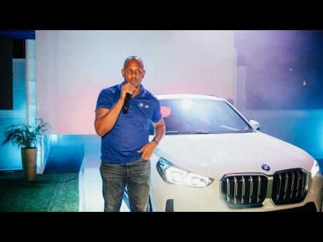 Sloane Jackson, head of business, BMW Jamaica, captivated an enthralled crowd with the new features of the all-electric BMW iX1.