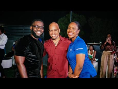 From left: Evan Dixon, sponsorship and public relations executive, British Caribbean Insurance Company Limited; Kori Thompson, artist and designer and Arielle Oliver, marketing executive, BMW and MINI Jamaica, are are smiles for our cameras.
