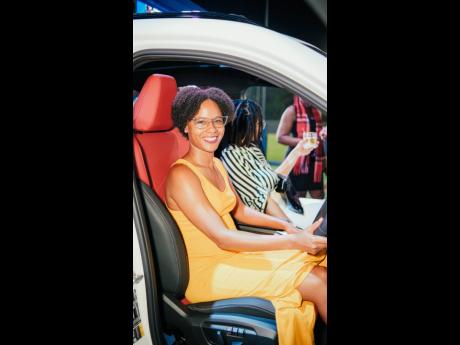The beautiful Stephanie Lumley, communications consultant, gets behind the wheel of the all-electric BMW iX1.