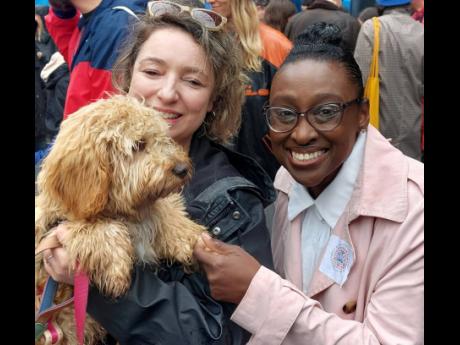 Councillor Anntoinette Bramble (right), deputy mayor of Hackney with a local resident as the borough celebrated at one of the many coronation street parties in east London.