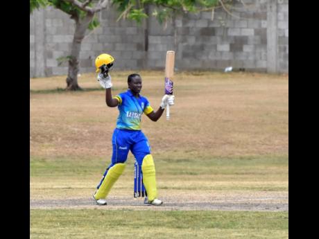Barbados Women’s batman Kyshona Knight celebrates after reaching her hundred against Jamaica Women in the West Indies Women’s Super50 Cup yesterday at the Conaree Sports Club in St Kitts. 