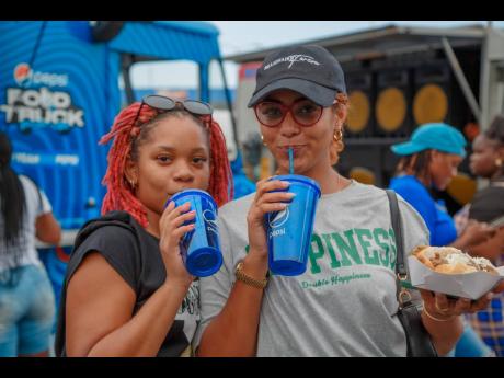 Friends Jhana-Lee Blake and Iana Garcia stopped by the the Pepsi Food Truck pop-up.