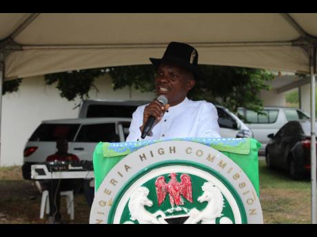 President of the Association of Nigerians in Jamaica Theophilus Okorie Eze addressing patrons during the Nigeria Cultural Day event on the lawns of the Nigerian High Commission along Waterloo Road in St Andrew on Saturday, May 13. 