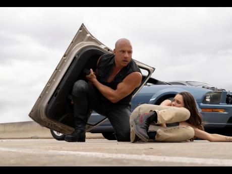 Vin Diesel (left), and Daniela Melchior in a scene from ‘Fast X’.