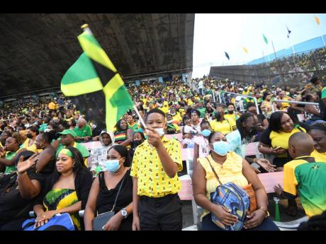 A section of people at the National Stadium celebrating Jamaica’s Diamond Jubilee Grand Gala celebrations.