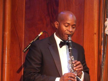 Rafael Salazar playing a Peter Ashbourne arrangement on his clarinet at the Philharmonic Orchestra of Jamaica concert.